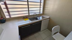 Kuchyňa alebo kuchynka v ubytovaní Apartamento Palmeras Del Sur