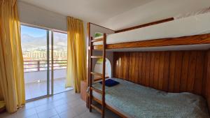 Posteľ alebo postele v izbe v ubytovaní Apartamento Palmeras Del Sur