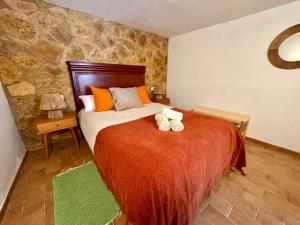 Postel nebo postele na pokoji v ubytování G&G Carratraca Village - Caminito del Rey