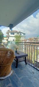 A balcony or terrace at Check-in & Chill