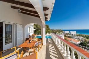a balcony with a view of the ocean at San Jaime View - stunning sea views close to resort in Son Bou