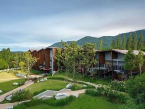 an aerial view of a resort with a garden at dusitD2 Khao Yai in Mu Si