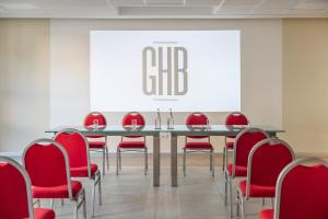 a conference room with a table and red chairs at Grand Hotel Bristol Spa Resort, by R Collection Hotels in Rapallo +37 photos