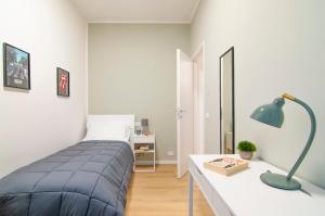 Ένα ή περισσότερα κρεβάτια σε δωμάτιο στο Italstay - Trieste 2 newly refurbished flat