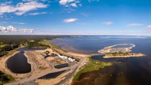 an aerial view of an island in the water at Marina Chalets RANGE by Hiekka Booking - sisältää liinavaatteet ja loppusiivouksen in Kalajoki