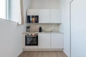 Dapur atau dapur kecil di Studio équipé côté rue, parking gratuit +9 gambar