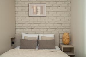 Posteľ alebo postele v izbe v ubytovaní RentPlanet - Apartament Szczytnicka