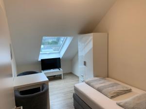 Postel nebo postele na pokoji v ubytování BestBoarding24