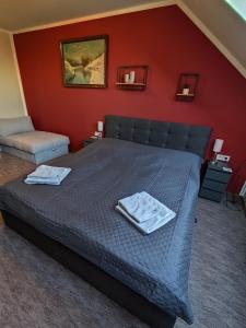 Postel nebo postele na pokoji v ubytování GT Apartman