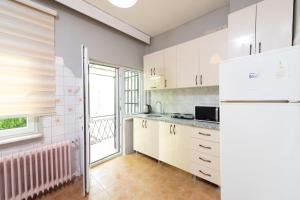 Kuchyň nebo kuchyňský kout v ubytování Galley Port Hotel