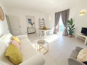 A television and/or entertainment centre at Pagliarulo Complex by AMALFIVACATION