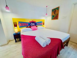 Postel nebo postele na pokoji v ubytování Mela By Half + 95 fotografií