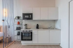 Η κουζίνα ή μικρή κουζίνα στο Studio équipé côté rue, parking gratuit