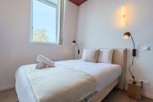 Ένα ή περισσότερα κρεβάτια σε δωμάτιο στο Studio équipé côté rue, parking gratuit