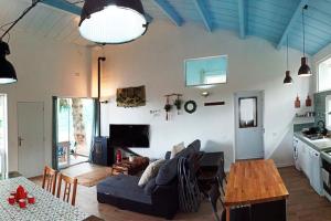 a living room with a couch and a table at El Pinsapo in Segovia