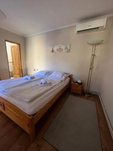 Postel nebo postele na pokoji v ubytování Eckhardt Vendégház