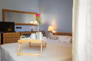 Postel nebo postele na pokoji v ubytování Hotel Cetarium