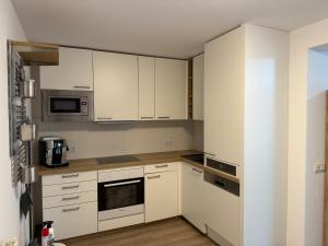 Cucina o angolo cottura di Urban Stay Kremsmünster Premium Apartment