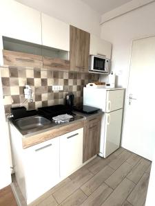 Nhà bếp/bếp nhỏ tại Vlasic Apartmani CENTAR