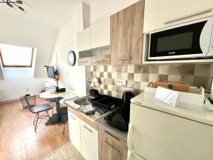 Nhà bếp/bếp nhỏ tại Vlasic Apartmani CENTAR