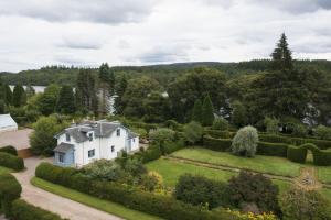 an aerial view of a house with a garden at Garden Cottage in Inverness
