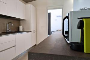 A kitchen or kitchenette at Home De Curtis