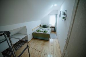 Katil atau katil-katil dalam bilik di Apartman Matija, Mokra Gora