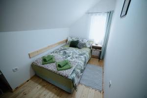 Katil atau katil-katil dalam bilik di Apartman Matija, Mokra Gora