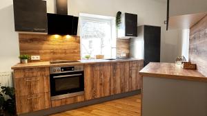 Afbeelding uit fotogalerij van Almtal Apartments in Viechtwang +18 foto's