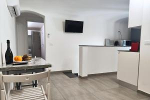 A kitchen or kitchenette at Home De Curtis