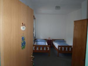 Postel nebo postele na pokoji v ubytování Gaberlhaus