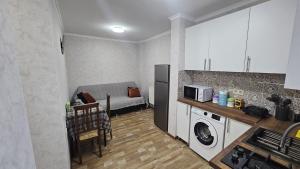 Kuchyň nebo kuchyňský kout v ubytování Apartment Oxalis