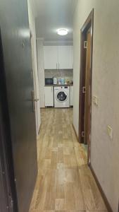Kuchyň nebo kuchyňský kout v ubytování Apartment Oxalis