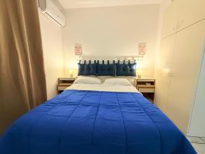A bed or beds in a room at Vinum27