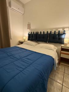 A bed or beds in a room at Vinum27