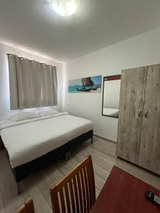 Ένα ή περισσότερα κρεβάτια σε δωμάτιο στο Soho Eilat