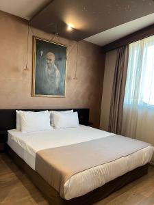 Postel nebo postele na pokoji v ubytování Design Hotel Mr President