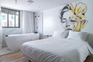 Ένα ή περισσότερα κρεβάτια σε δωμάτιο στο Up Hotel Boutique