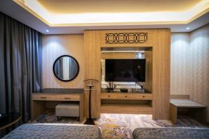 Postel nebo postele na pokoji v ubytování Mirnian Hotel