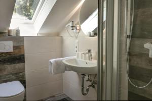 Koupelna v ubytování Landhotel Baumwipfel