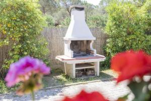 Zahrada ubytování Villino Michela - HelloElba