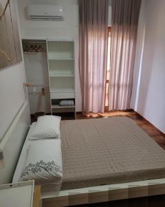 Postel nebo postele na pokoji v ubytování A casa di Pintus