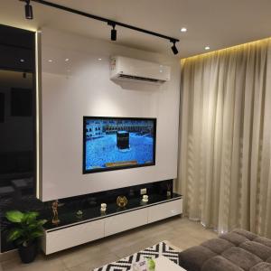 TV a/nebo společenská místnost v ubytování Madinity B8 - Fantasy Studio