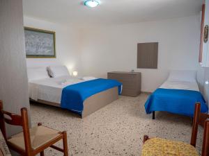 A bed or beds in a room at Villa Cordella 3