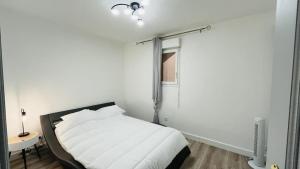 Postel nebo postele na pokoji v ubytování Appartement Cala Di Mare L'ILE ROUSSE