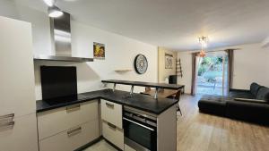 Kuchyň nebo kuchyňský kout v ubytování Appartement Cala Di Mare L'ILE ROUSSE