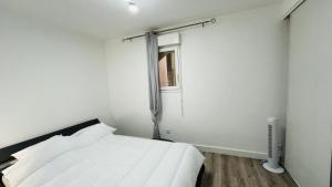 Postel nebo postele na pokoji v ubytování Appartement Cala Di Mare L'ILE ROUSSE