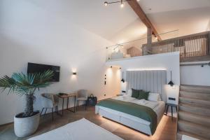 Łóżko lub łóżka w pokoju w obiekcie Ferienwelt Kesselgrub Hotel in Altenmarkt-Zauchensee