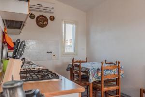 Η κουζίνα ή μικρή κουζίνα στο la Casa di Elvira +15 φωτογραφίες