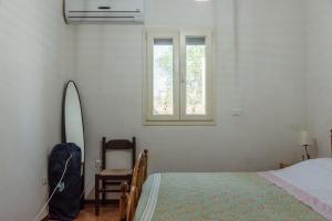 Ένα ή περισσότερα κρεβάτια σε δωμάτιο στο la Casa di Elvira